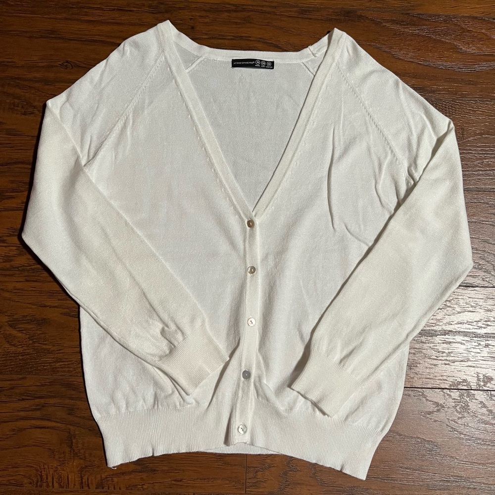 Short cardigan sweater. The brand is Atmosphere.